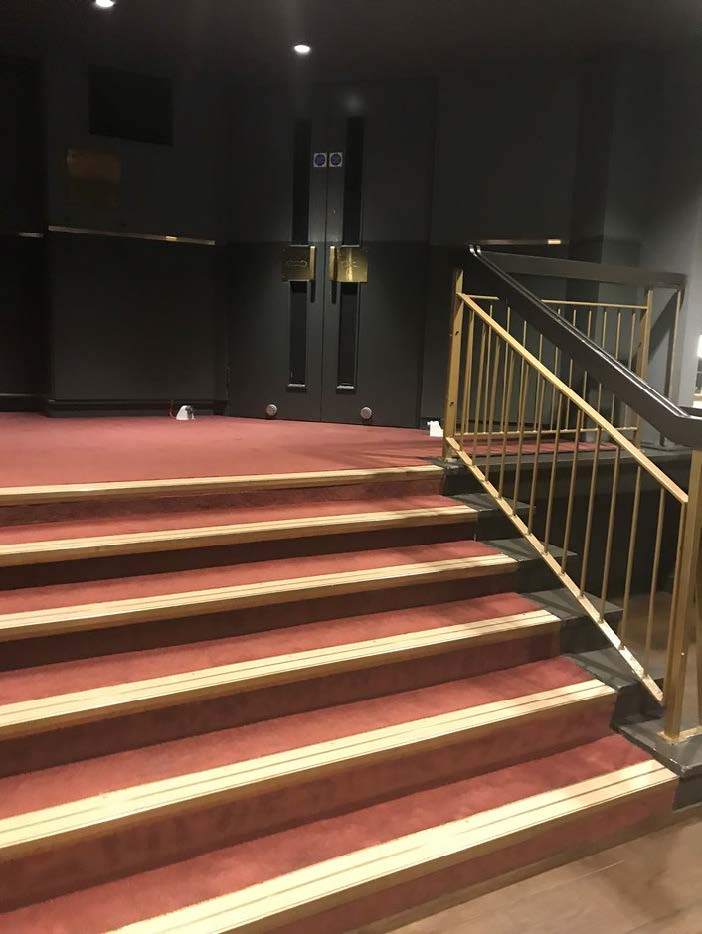 A picture of a short slight of stairs in the Peacock Theatre 