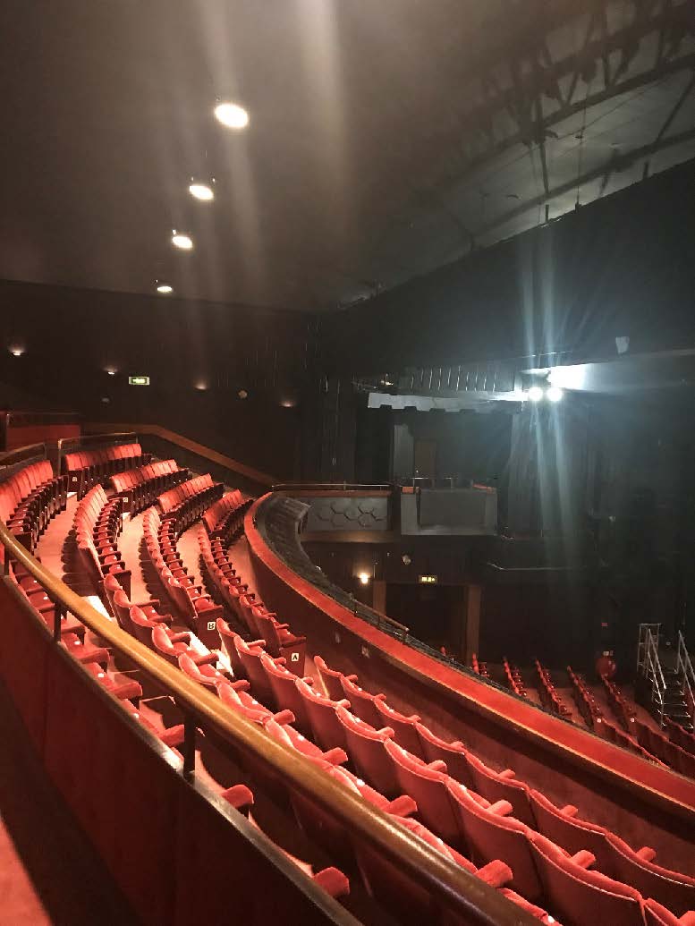A picture of rows of red seats in the Peacock Theatre auditorium 