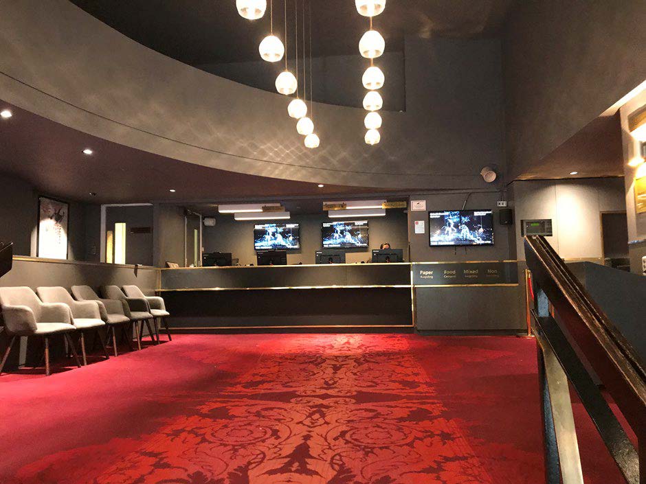 The Peacock Theatre foyer with red carpet and the ticket desk opposite the entrance