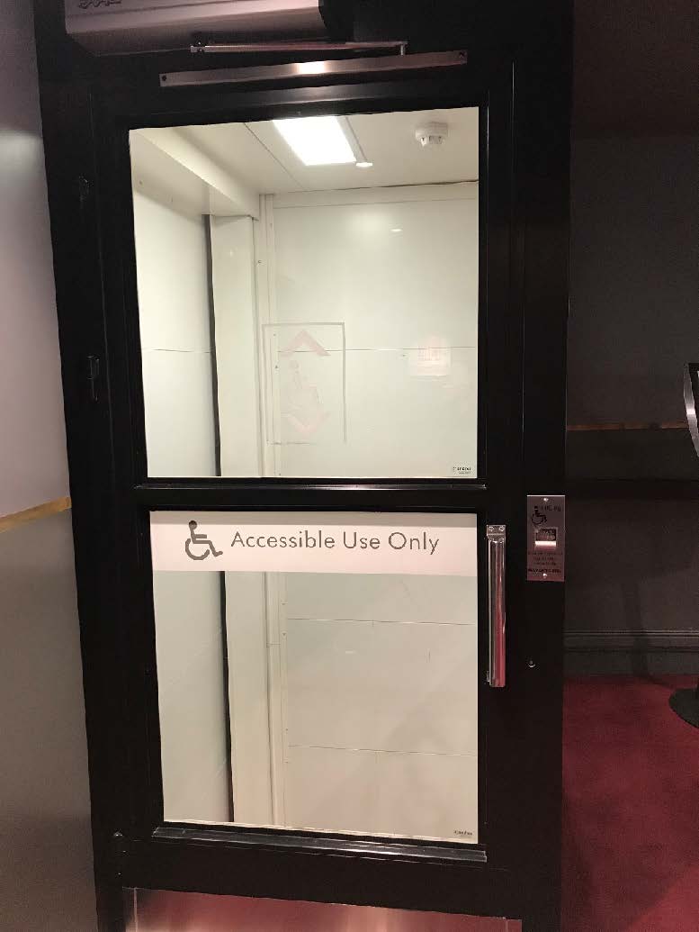 A photo of the door of the accessible lift at the Peacock Theatre 