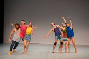 Six dancers performing onstage