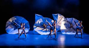 A group of ballet dancers performing onstage