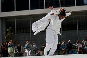 One dancer holding another in a lift